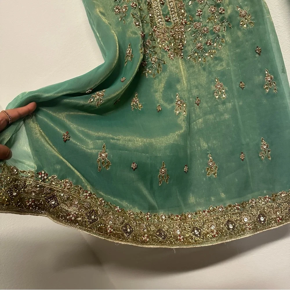 Two piece formal salwar kameez in a soft sea-green shade with intricate gold - Picture 7 of 9